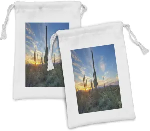 Ambesonne Saguaro Fabric Pouch Set of 2, Sun is Setting Between Cactus Plants with Spines Noon Landscape Wild Design, Small Drawstring Bag for Toiletries Masks and Favors, 9" x 6", Green Blue