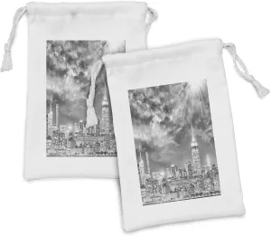 Ambesonne Urban Fabric Pouch Set of 2, Dramatic New York City Skyline Sun Beams Clouds Skyscrapers Monochrome Landscape, Small Drawstring Bag for Toiletries Masks and Favors, 9" x 6", Black White
